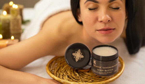 Sandalwood body butter with lady at spa